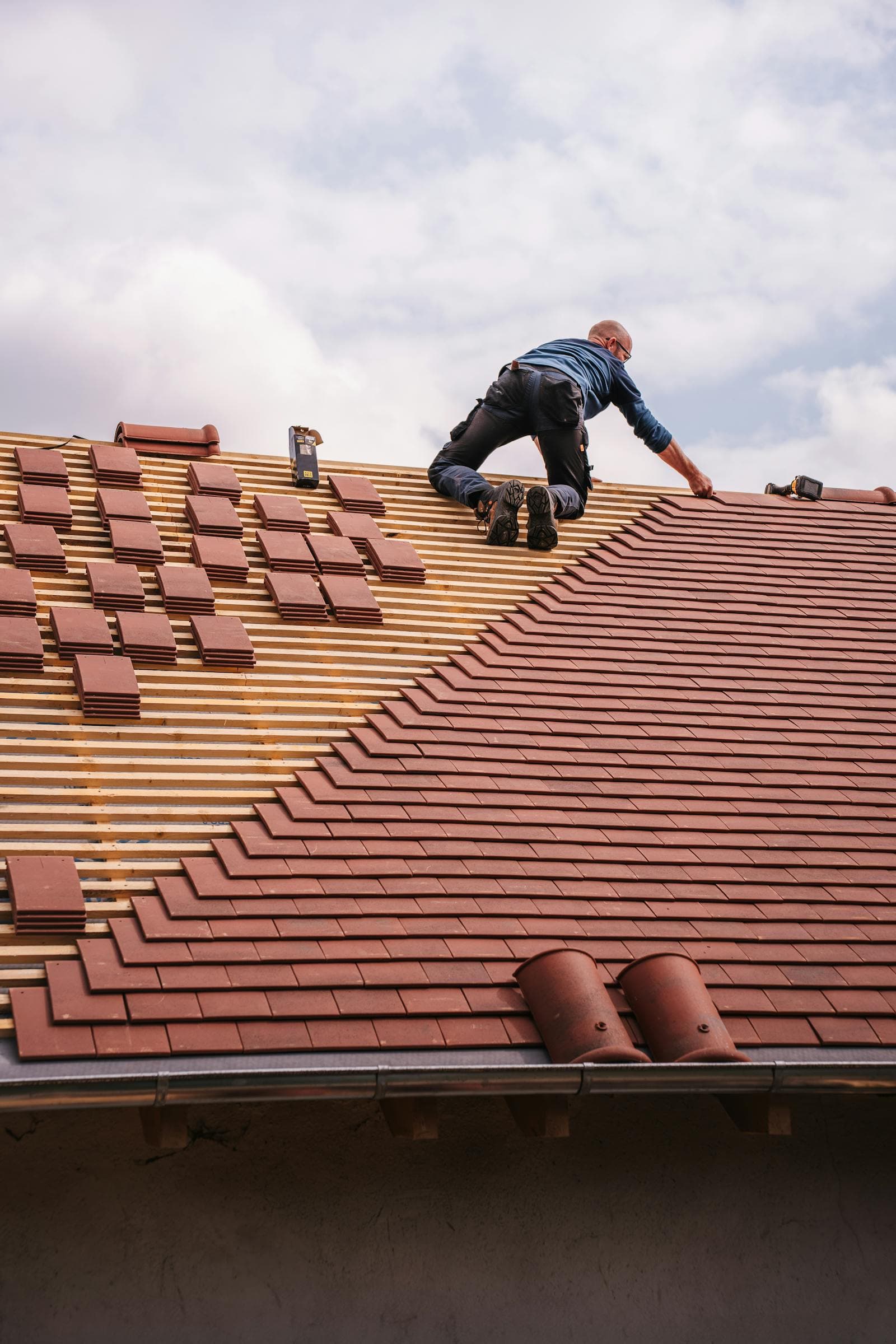Roofer working on a residential roof repair